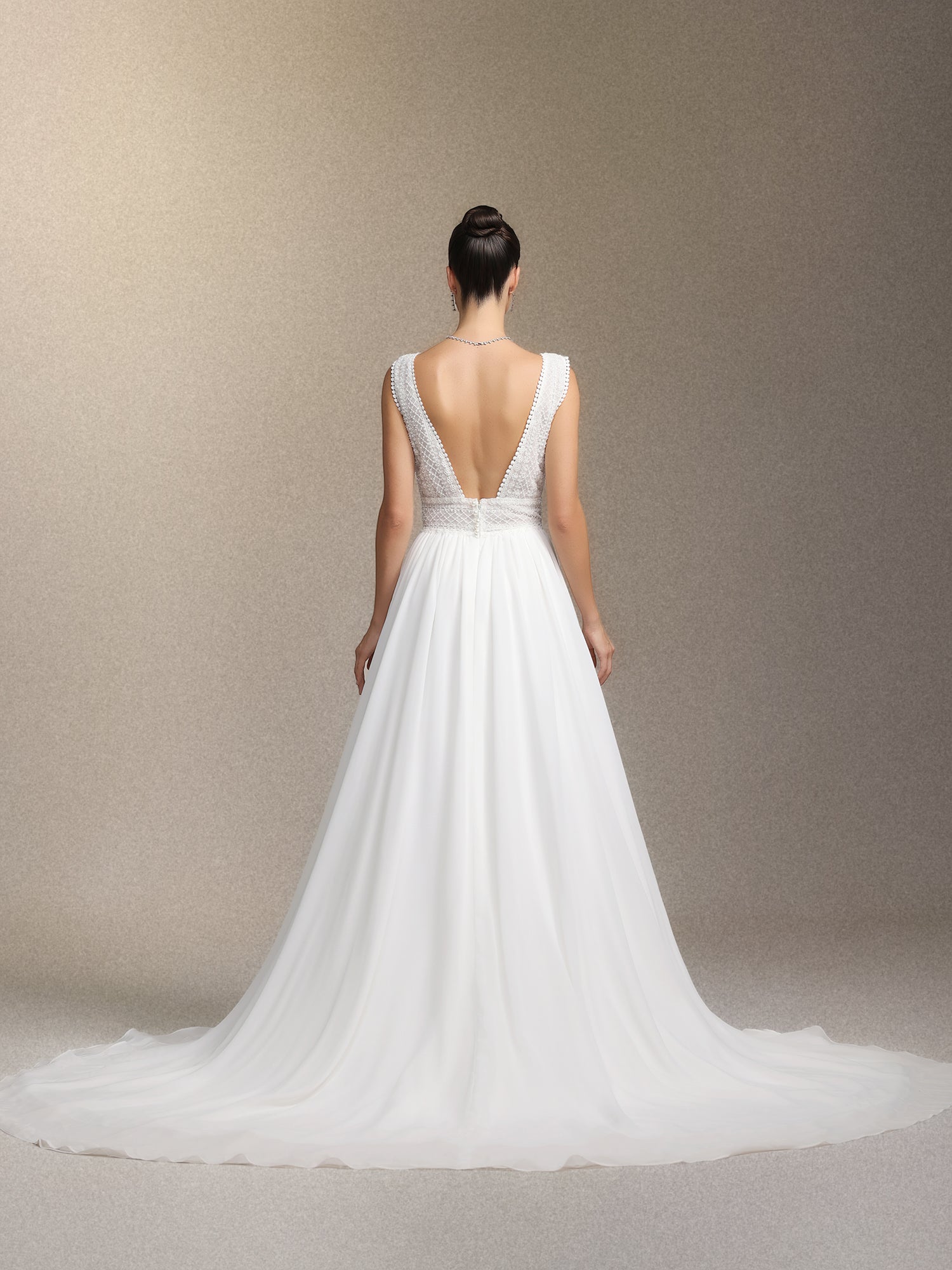 Yalyka Deep V-neck sleeveless high-waisted wedding maxi dress