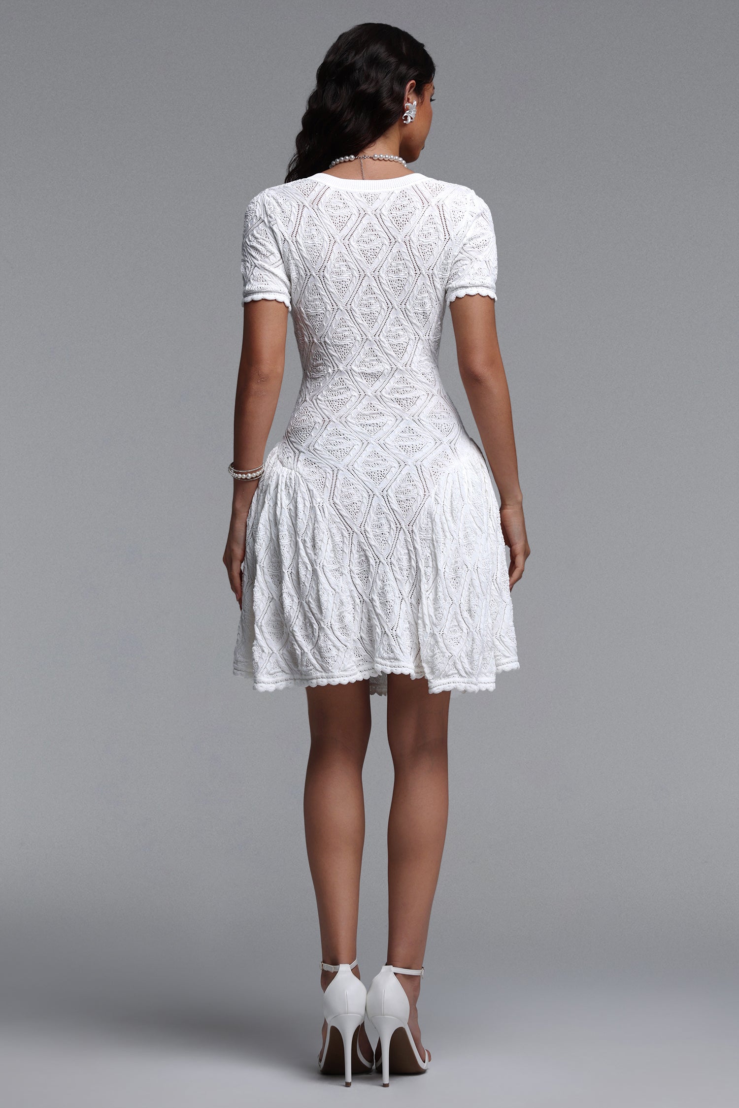 Liama Resort Cinched Short Sleeve Jacquard Knit Mini Dress