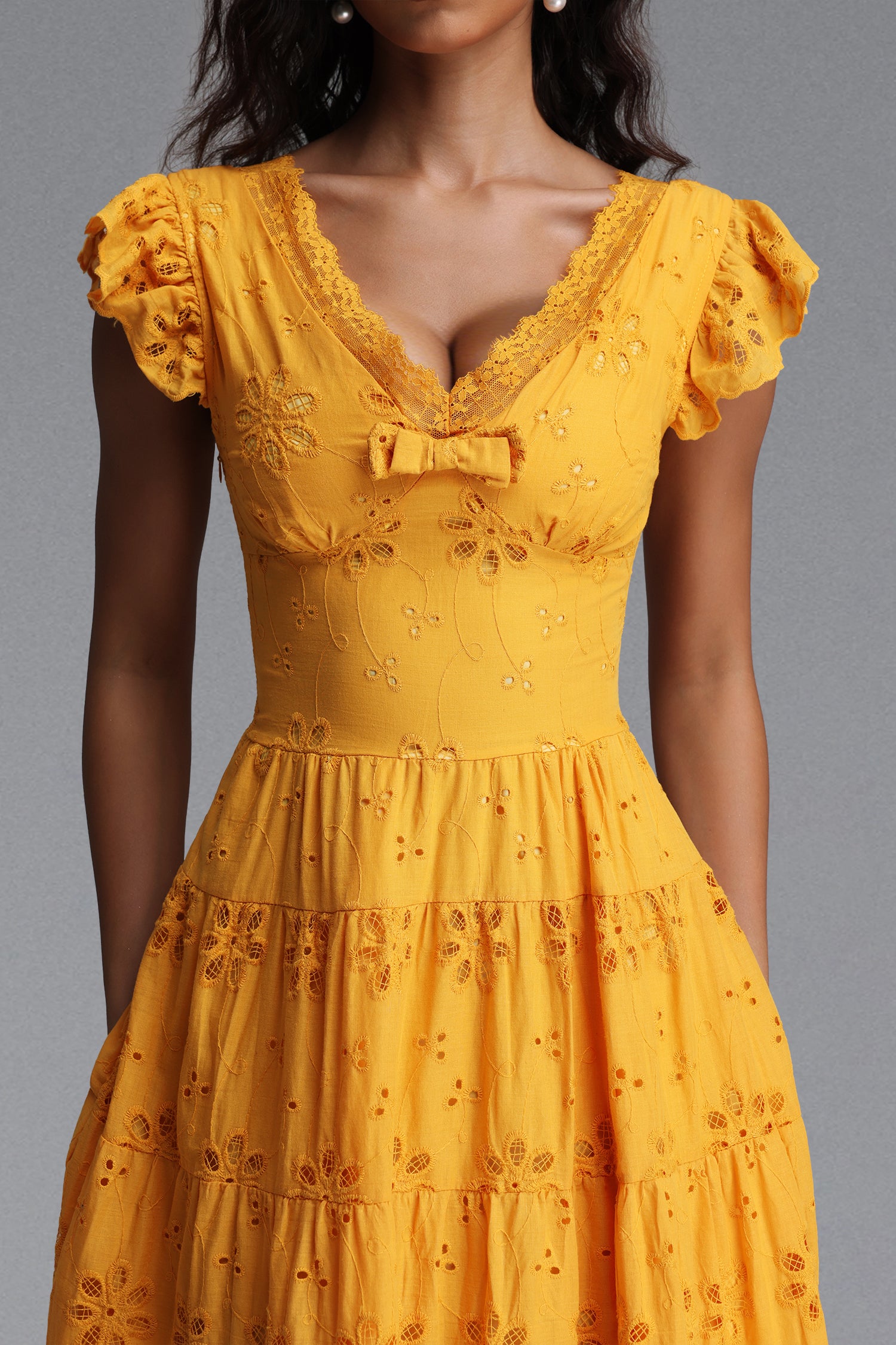 Jerlyn Resort Flowy V Neck Sleeveless Bow Ruffle Woven Maxi Dress